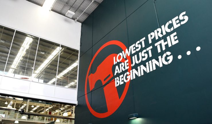 A Lowest Prices are Just the Beginning... sign is seen at a Bunnings hardware store at Chatswood, in Sydney, Friday, Feb. 20, 2015. (AAP Image/Dan Himbrechts) NO ARCHIVING