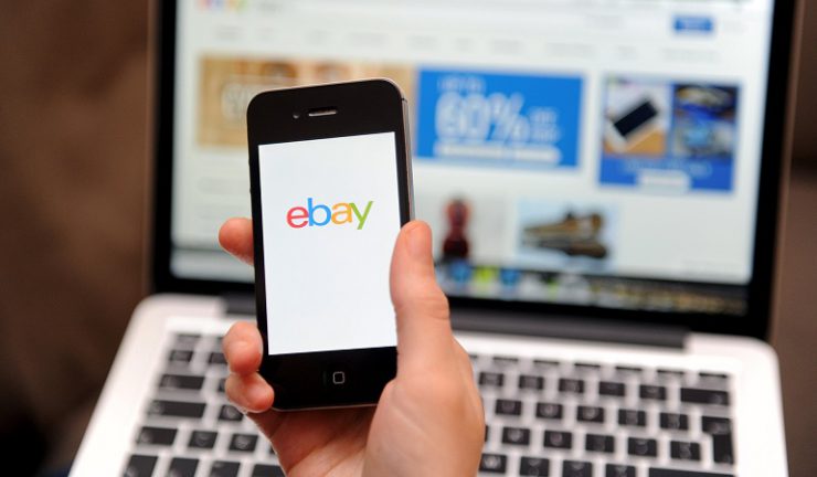 Sept. 2, 2015 - Nottingham, UK - Embargoed to 0001 Thursday September 3 File photo dated 01/12/14 of a woman using a smartphone to browse the eBay website, as the auction site, which started from humble beginnings as a software programmer's hobby, has since grown into one of the world's biggest e-commerce firms and this month celebrates its 20th anniversary. (Credit Image: © Tim Goode/PA Wire via ZUMA Press)