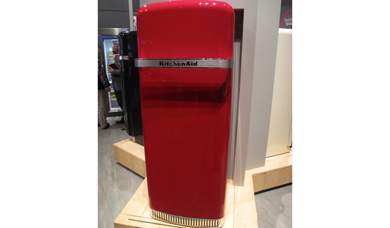 A red KitchenAid refrigerator on display in Milan.